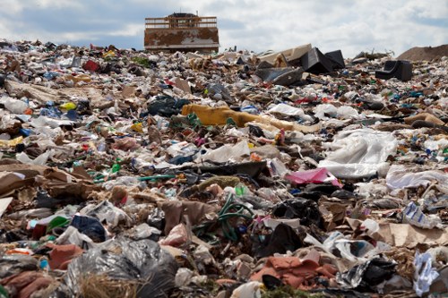 Construction workers managing waste on site